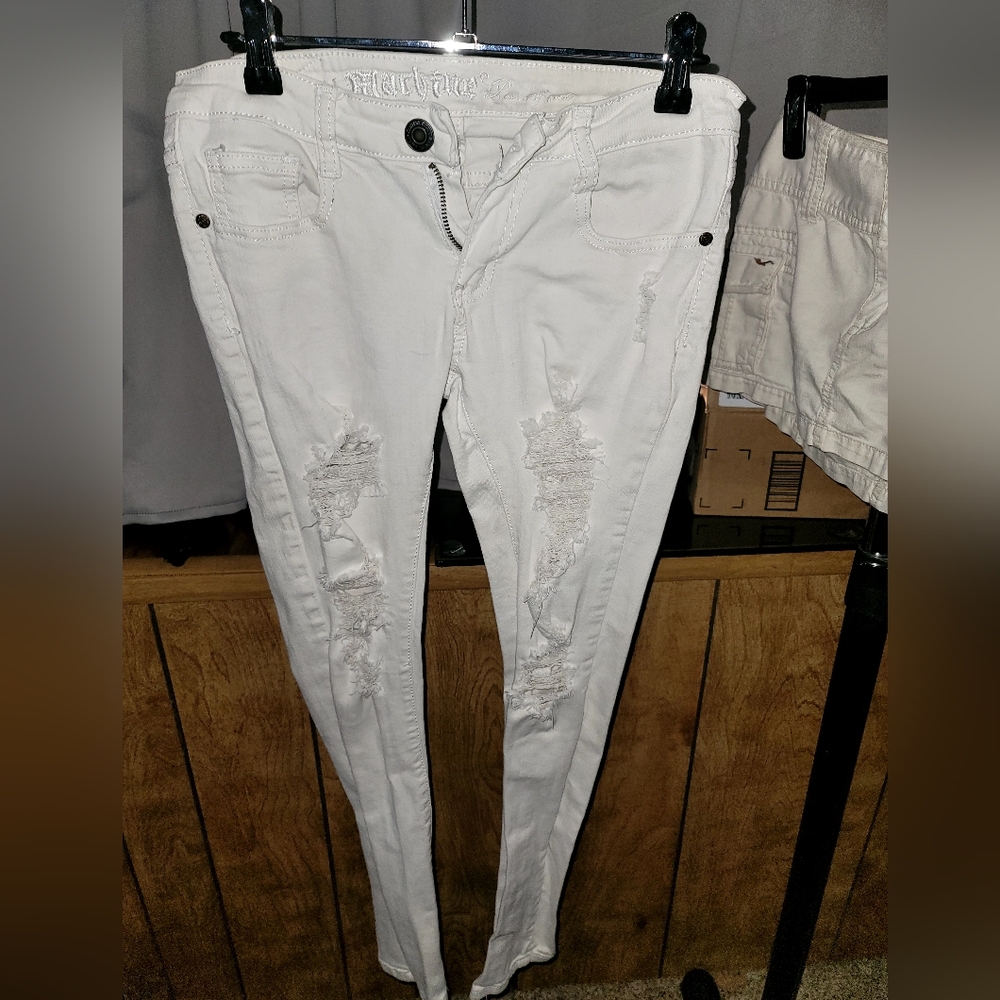Skinny ripped white italian jeans